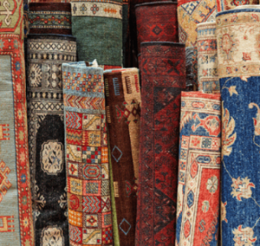 Tips for layering an area rug over carpet